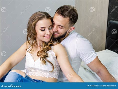 Young couple passionately making love. 